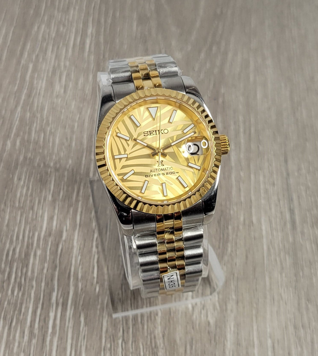 Gold Palm Dial Date Watch