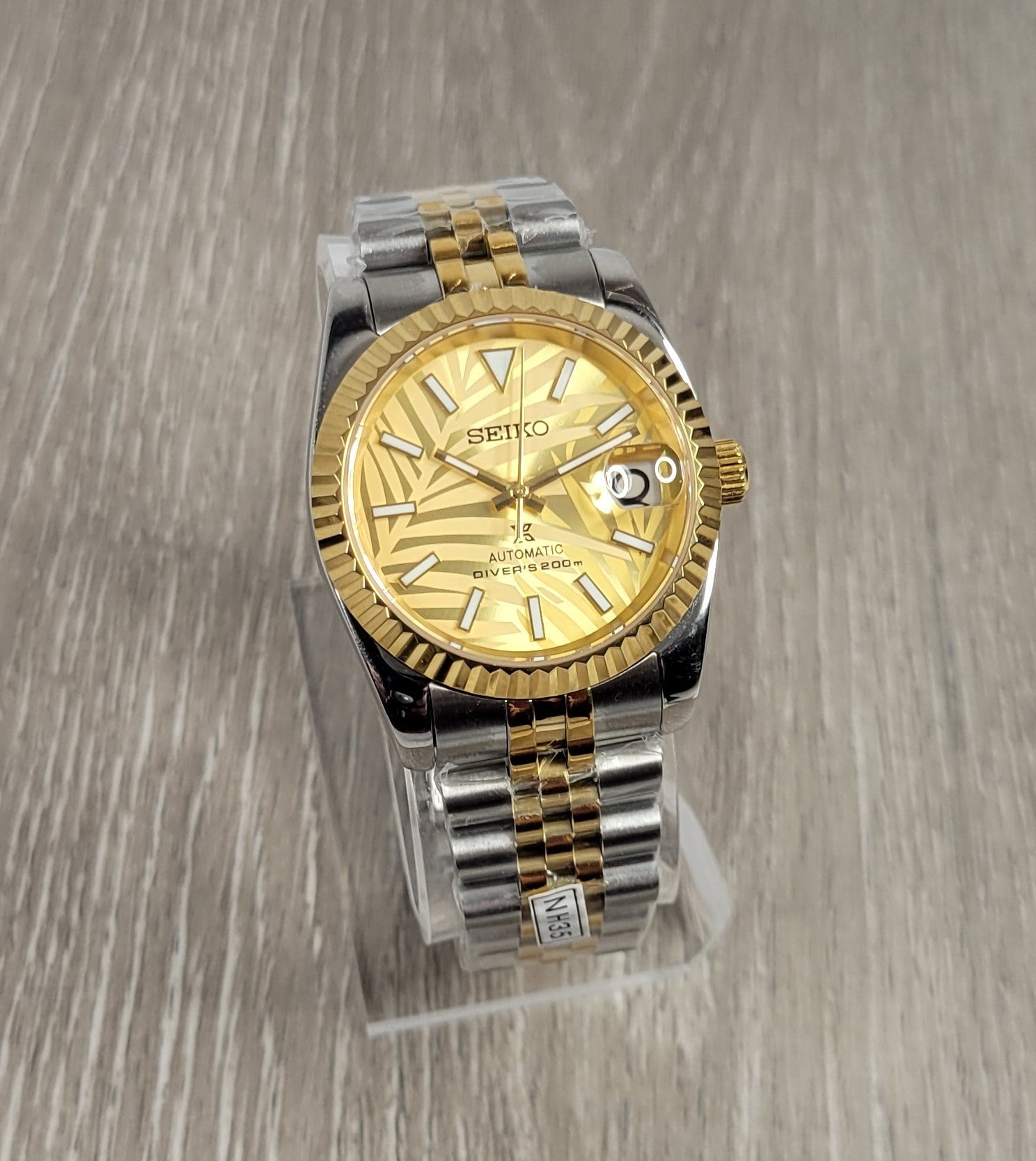 Gold Palm Dial Date Watch