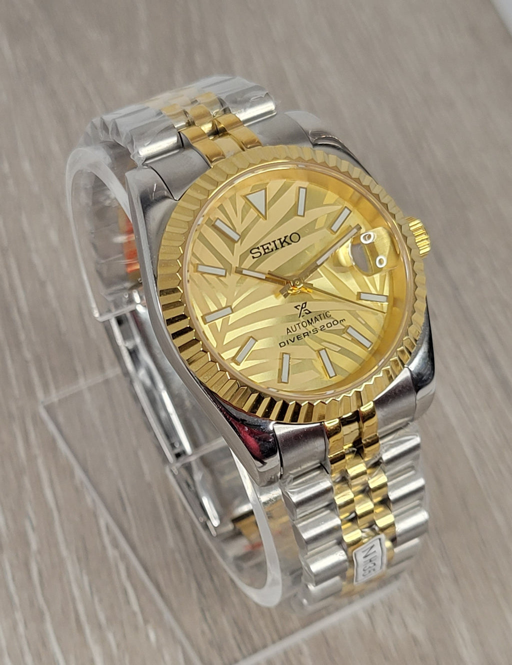 Gold Palm Dial Date Watch
