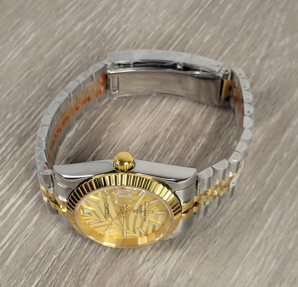 Gold Palm Dial Date Watch