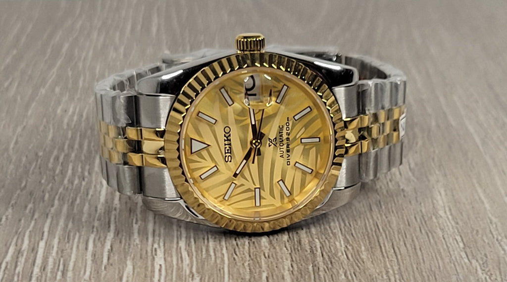 Gold Palm Dial Date Watch