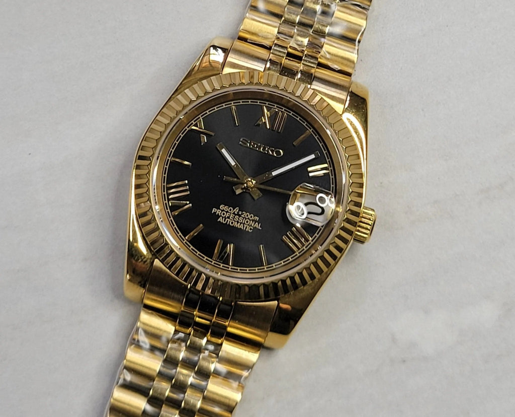 Gold Roman Numerals Date Watch