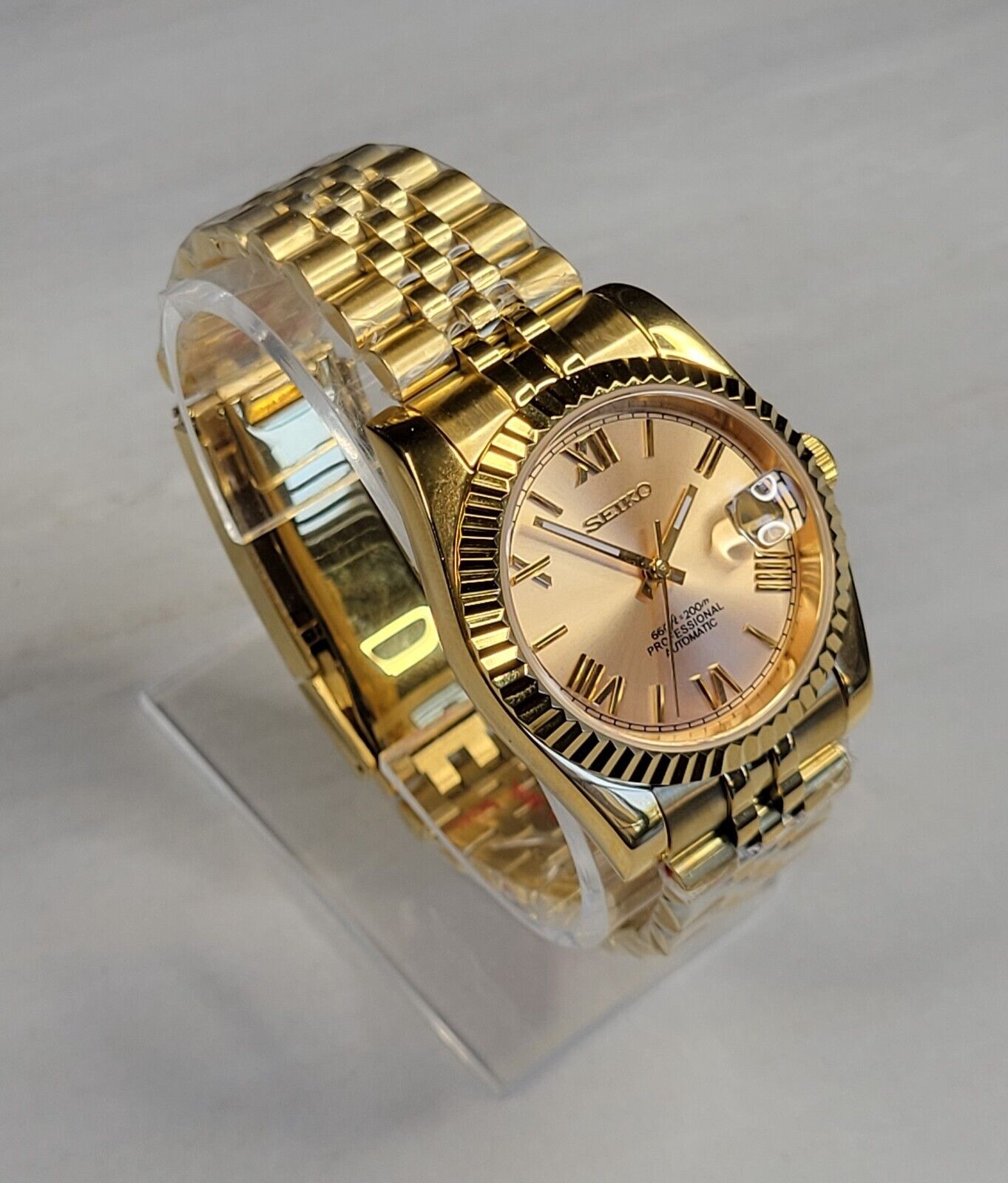Gold Roman Numerals Date Watch
