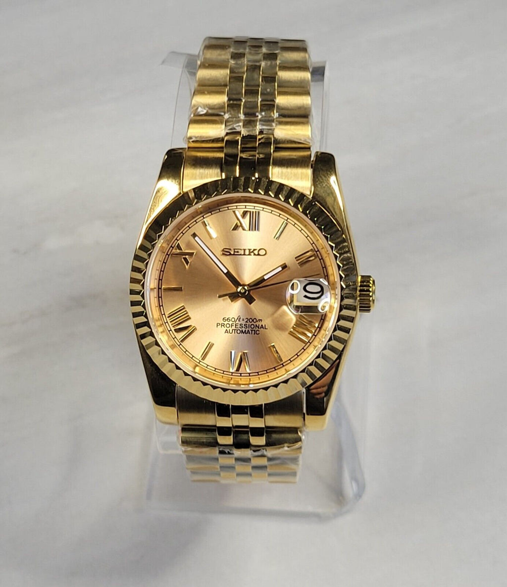 Gold Roman Numerals Date Watch