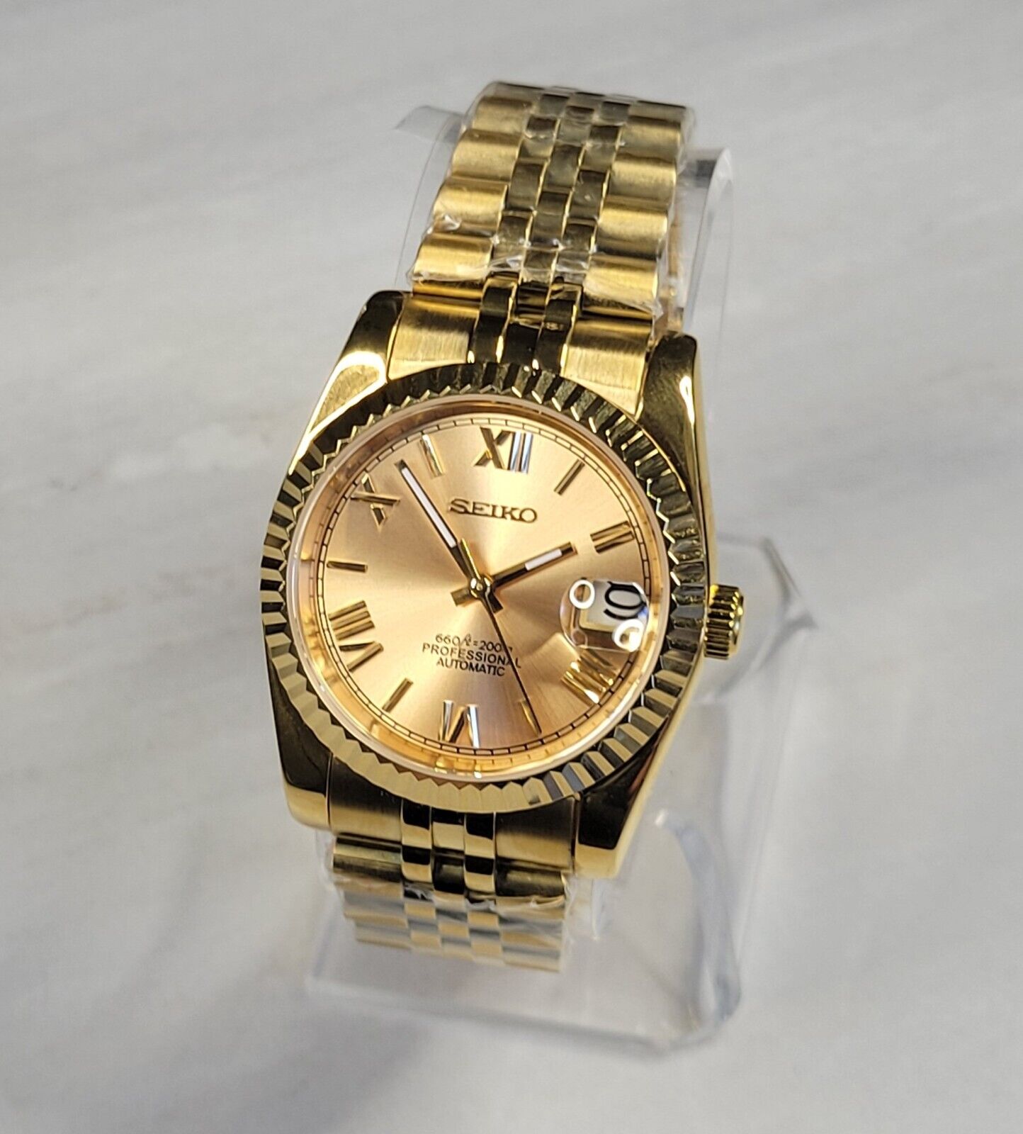 Gold Roman Numerals Date Watch