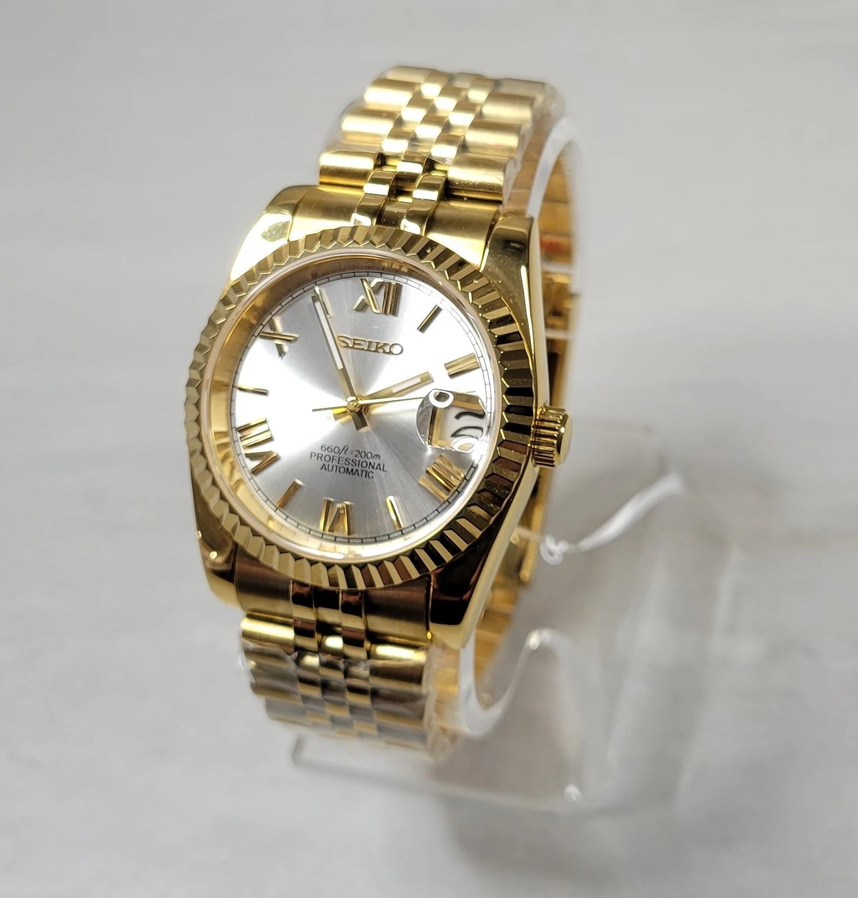 Gold Roman Numerals Date Watch